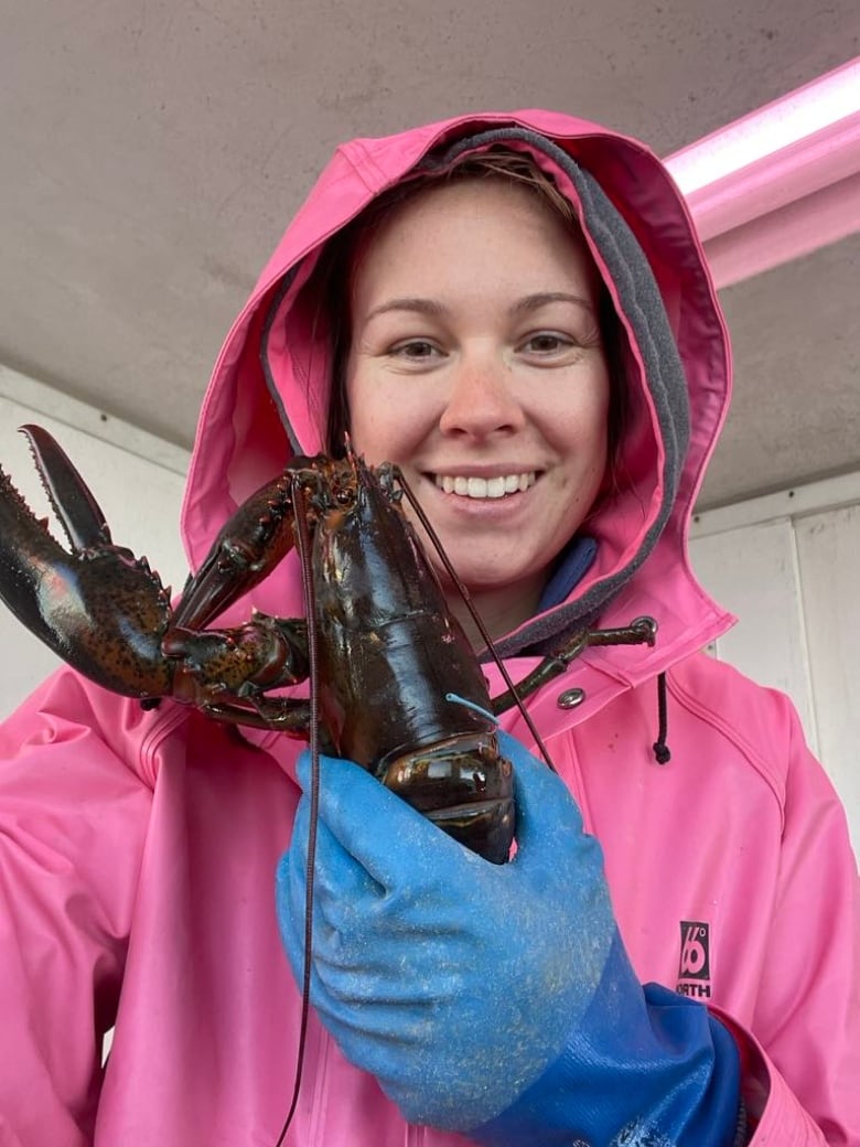 Emily Blacklock holds a lobster