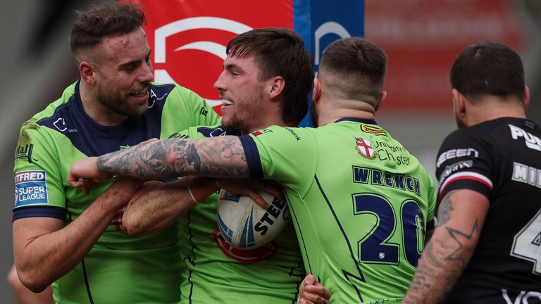 Adam Holroyd of Warrington Wolves celebrates scoring his team's first try against London Broncos (SWpix)