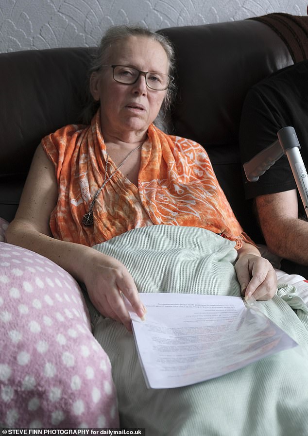 Moment stage 4 cancer sufferer is evicted from her own home by High Court enforcement officers watched on by police after long-running council tax bill battle