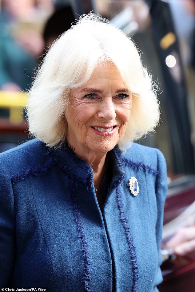 Queen Camilla appears in high spirits as she arrives at Douglas Borough Council in Isle of Man to present the Letters Patent conferring its City status