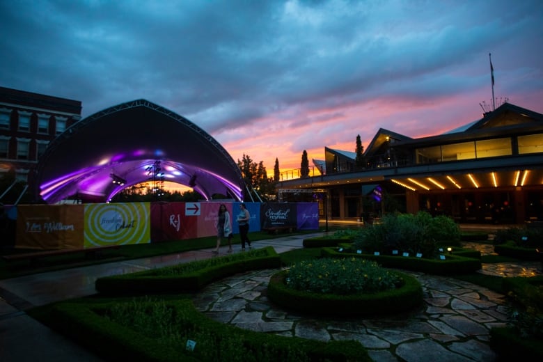 A theatre tent pictured at sunset.