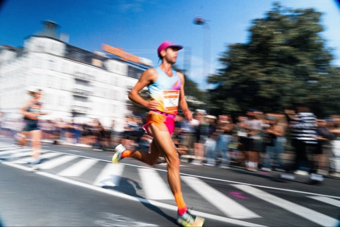 A runner in Soar rainbow kit during the Copenhagen Marathon