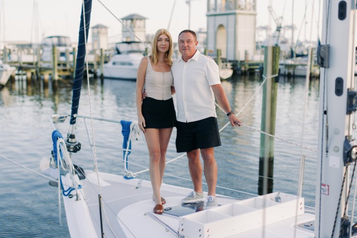 Jason Todt and his wife Evgenia Grydnieva on their sailboat, moored in Gulfport, Mississippi