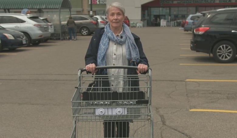 Susan Dennison with a shopping cart at a Fortinos grocery store. 