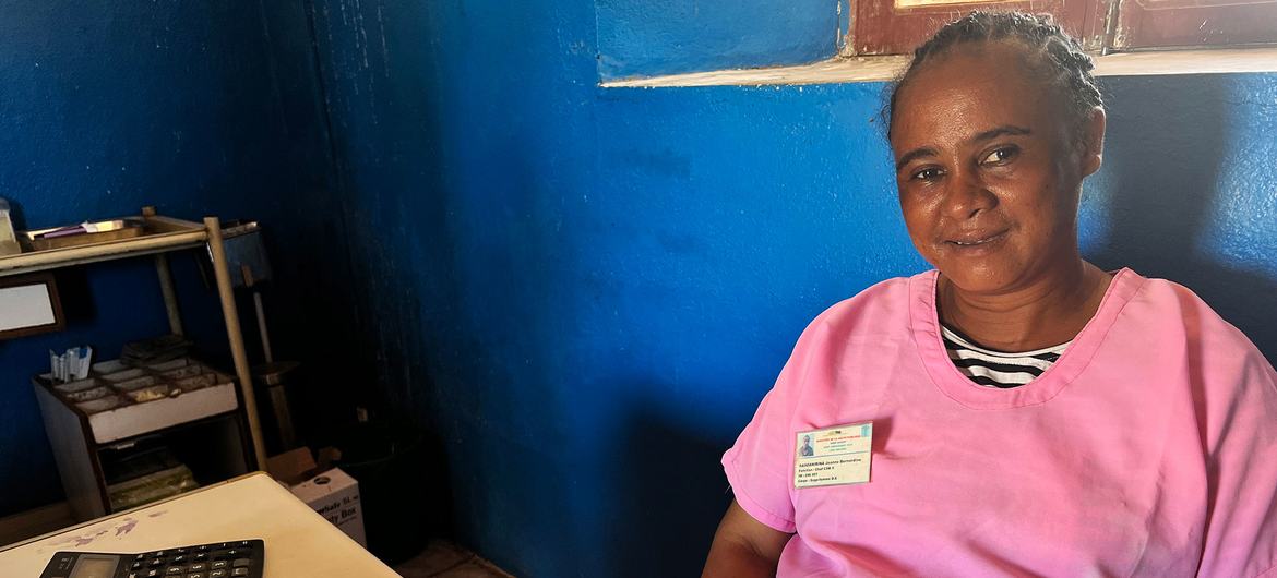 Jeanne Bernadine Rasoanirina sits at her desk with the recently delivered maternity kits.