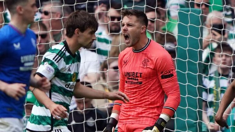 Jack Butland celebrates after saving Matt O'Riley's penalty