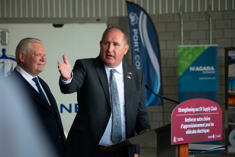 A man speaking at a podium.