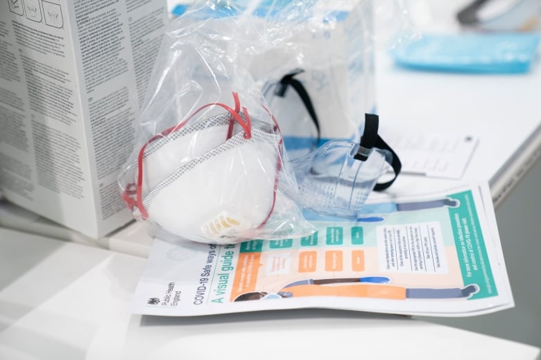 A view of masks and goggles, part of personal protective equipment or PPE.