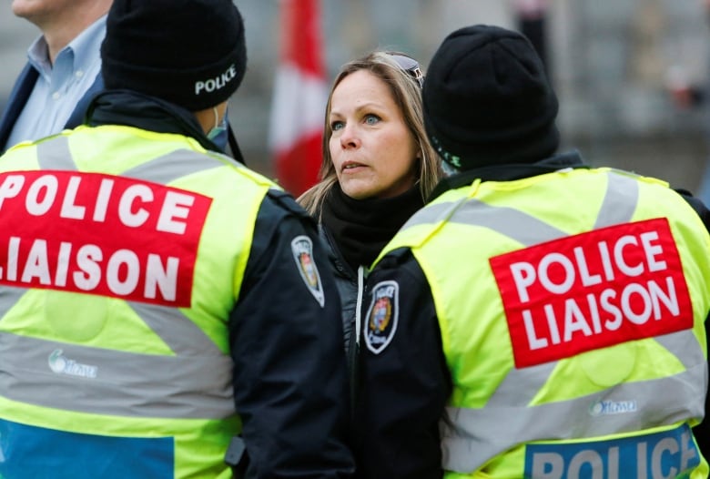 Tamara Lich, an organizer of Ottawa's protest, speaks with police liaison officers Feb. 10, 2022.