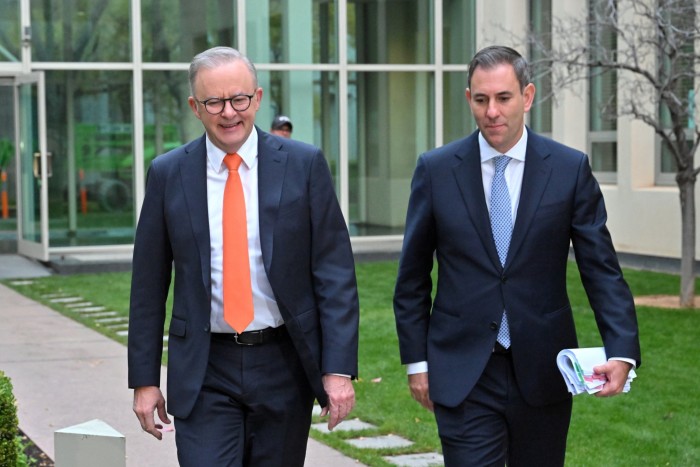 Australia’s Prime Minister Anthony Albanese, left, and treasurer Jim Chalmers arrive in Canberra