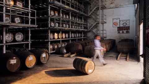 Master blender Anup Barik in the cask warehouse for Rampur Distillery, Uttar Pradesh