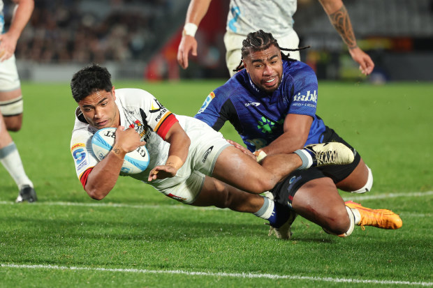 Josh Ioane of the Chiefs scores a try at Eden Park.