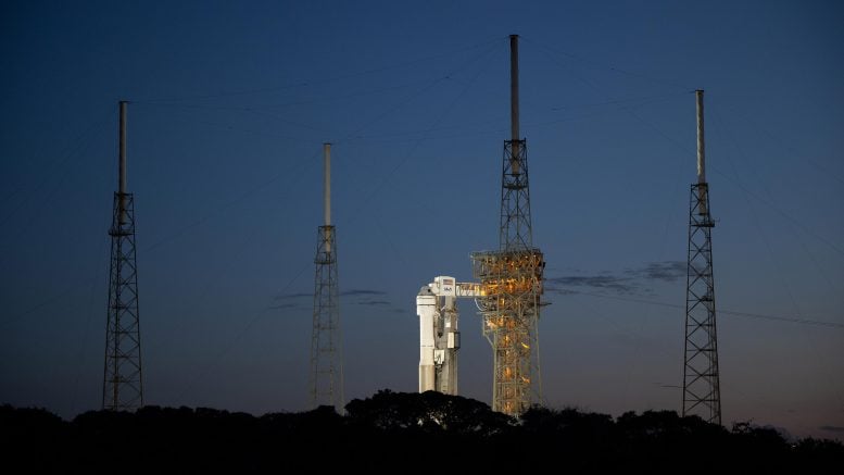 Atlas V Rocket With Boeing CST-100 Starliner Spacecraft Aboard on Launch Pad at Sunset