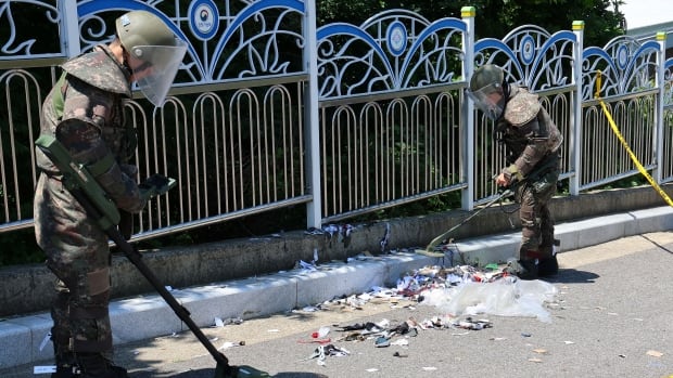 North Korea says it will suspend sending retaliatory trash balloons to South Korea