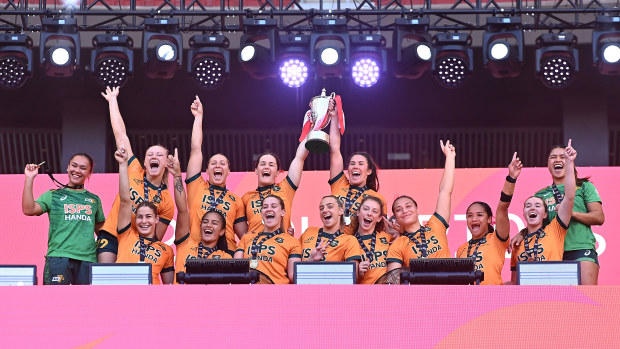 The Australian team celebrates with the trophy after beating France in the HSBC Madrid Rugby Sevens Final match at Civitas  Metropolitano Stadium on June 02, 2024 in Madrid, Spain. (Photo by Denis Doyle/Getty Images)