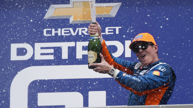 Scott Dixon celebrates after winning the IndyCar Detroit Grand Prix auto race in Detroit, Sunday, June 2, 2024. (AP Photo/Paul Sancya)