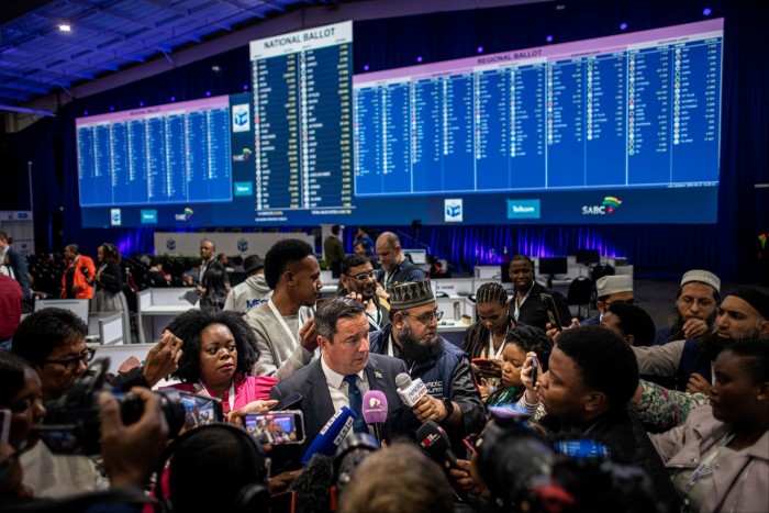 Democratic Alliance leader John Steenhuisen speaks with the media