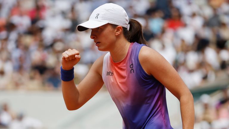 Poland's Iga Swiatek reacts during the women's final of the French Open tennis tournament against Italy's Jasmine Paolini at the Roland Garros stadium in Paris, France, Saturday, June 8, 2024. (AP Photo/Jean-Francois Badias)