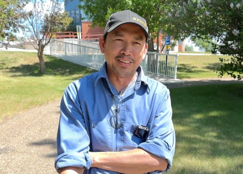 A man wearing a hat is pictured.