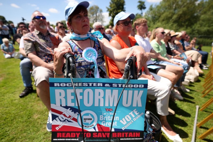 Reform UK supporters attend a Nigel Farage election campaign event in Maidstone, 