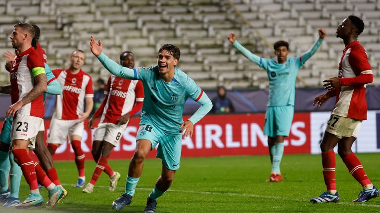 Barcelona's Marc Guiu celebrates after scoring his sides second goal during the Champions League Group H soccer match between Antwerp and Barcelona at the Bosuil stadium in Deurne, Belgium, Wednesday, Dec. 13, 2023. (AP Photo/Geert Vanden Wijngaert)