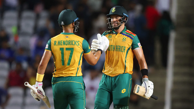 Aiden Markram and Reeza Hendricks of South Africa celebrate victory in the ICC Men's T20 Cricket World Cup West Indies & USA 2024 Semi-Final match between South Africa and Afghanistan at Brian Lara Cricket Academy on June 26, 2024 in Tarouba, Trinidad And Tobago. (Photo by Robert Cianflone/Getty Images)