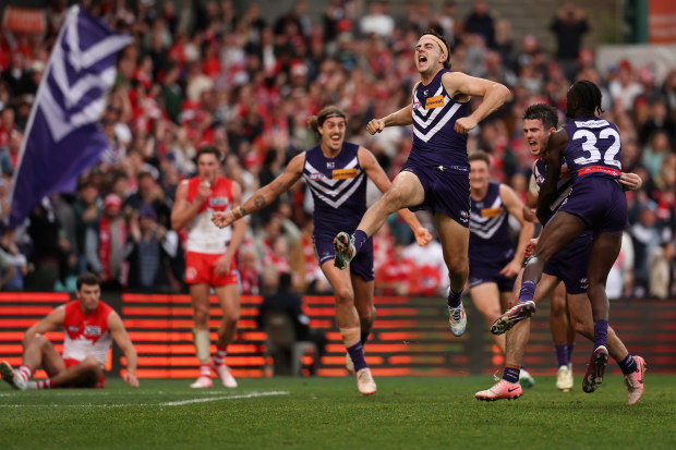 Jordan Clark celebrates winning by one point over Sydney in round 16.