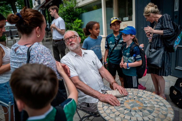 Jeremy Corbyn, the independent candidate in Islington North, talks with supporters