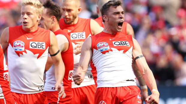 Will Hayward of the Swans celebrates kicking a goal during the 2022 AFL Grand Final match between the Geelong Cats and the Sydney Swans at the Melbourne Cricket Ground on September 24, 2022 in Melbourne, Australia. (Photo by Mark Kolbe/AFL Photos/via Getty Images)