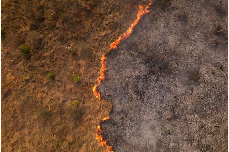 Aerial view of a fire outbreak in a rural area of Corumba, Mato Grosso do Sul State, Brazil, taken on June 25, 2024