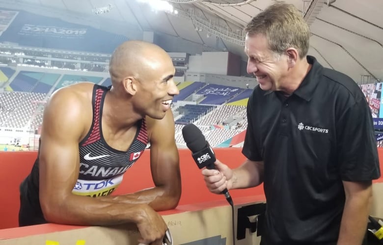 CBC Sports reporter interviewing Canadian male decathlete.