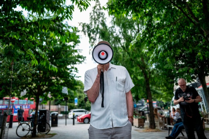 Jeremy Corbyn with loudspeaker while campaigning