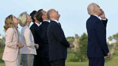 Italy’s Prime Minister Giorgia Meloni, President of the European Commission Ursula von der Leyen, British Prime Minister Rishi Sunak, French President Emmanuel Macron, German Chancellor Olaf Scholz, US President Joe Biden attend a flags ceremony at the G7 summit