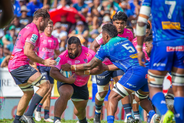 Taniela Tupou of the  Melbourne Rebels runs with the ball.