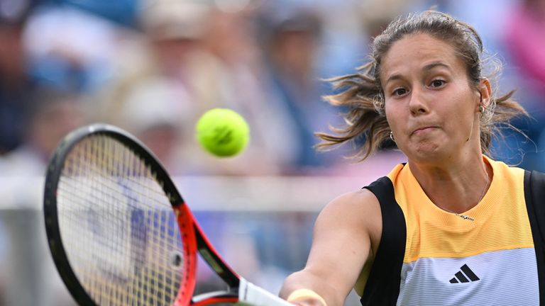 Russia's Daria Kasatkina hits a return to Britain's Emma Raducanu during their women's singles quarter final tennis match at the Rothesay Eastbourne International tennis tournament in Eastbourne, southern England, on June 27, 2024. (Photo by Glyn KIRK / AFP)