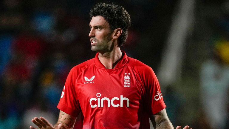 England's Reece Topley..prepares prepares for a delivery against West Indies during the fourth T20 cricket match at Brian Lara Stadium in Tarouba, Trinidad and Tobago, Tuesday, Dec. 19, 2023. (AP Photo/Ricardo Mazalan)