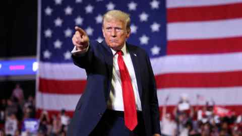 Former US President and Republican presidential candidate Donald Trump gestures during a campaign event in Philadelphia, Pennsylvania