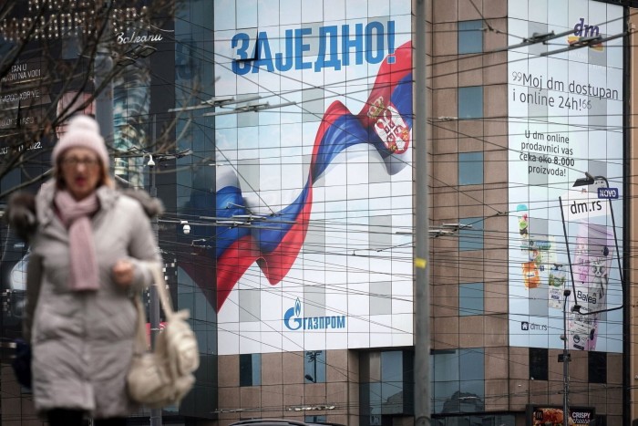 A billboard advertisement for Gazprom PJSC, featuring the Russian and Serbian national flags,