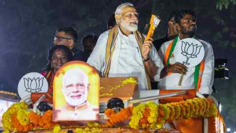 Indian Prime Minister Narendra Modi, centre, campaigns with Tamil Nadu Bharatiya Janata party chief K Annamalai, right, in Chennai on Tuesday