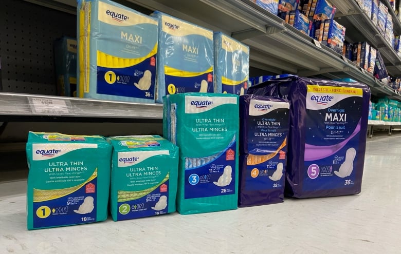 A line of pads is seen on the floor of a store.