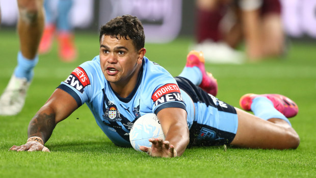Latrell Mitchell of the Blues scores a try during game three of the 2021 State of Origin Series between the New South Wales Blues and the Queensland Maroons at Cbus Super Stadium on July 14, 2021 in Gold Coast, Australia. (Photo by Chris Hyde/Getty Images)