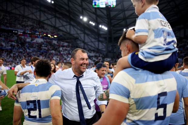 Michael Cheika of Argentina, celebrates with the team following their victory.