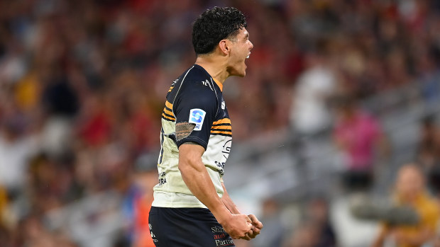 Noah Lolesio of the Brumbies celebrates the victory.