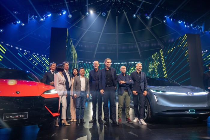 Oliver Blume with other executives at a Volkswagen launch event in Beijing, China