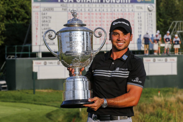 Jason Day holds aloft the Wanamaker trophy.