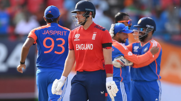 Liam Livingstone of England reacts as he walks off after being run out by India.