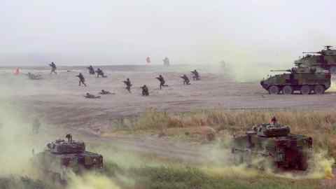 Soldiers participate in the annual Han Kuang military exercises that simulate an anti-landing operations near the coast in New Taipei City, northern Taiwan