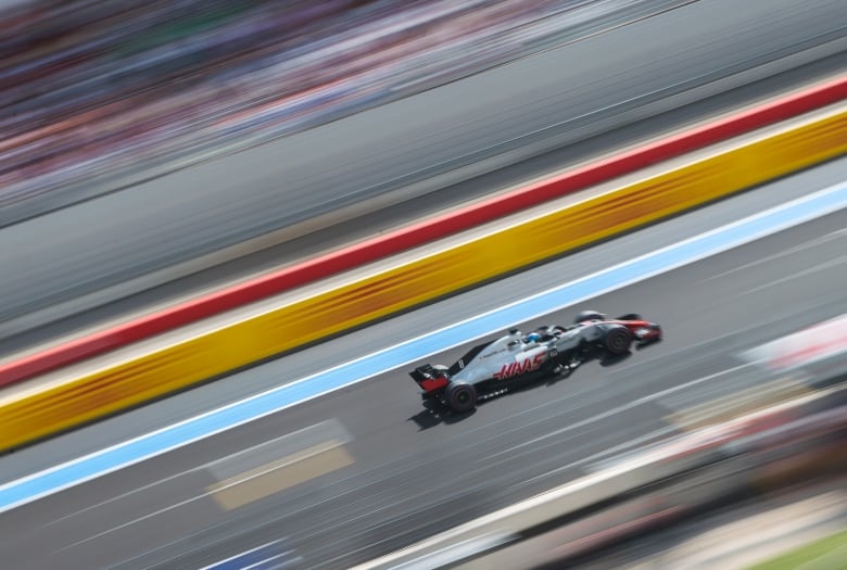 A shot of a professional race car mid-race.