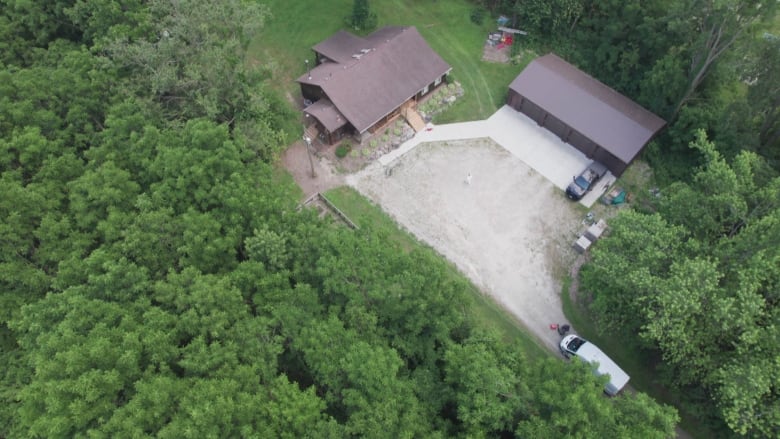 An aerial view of a rural home.