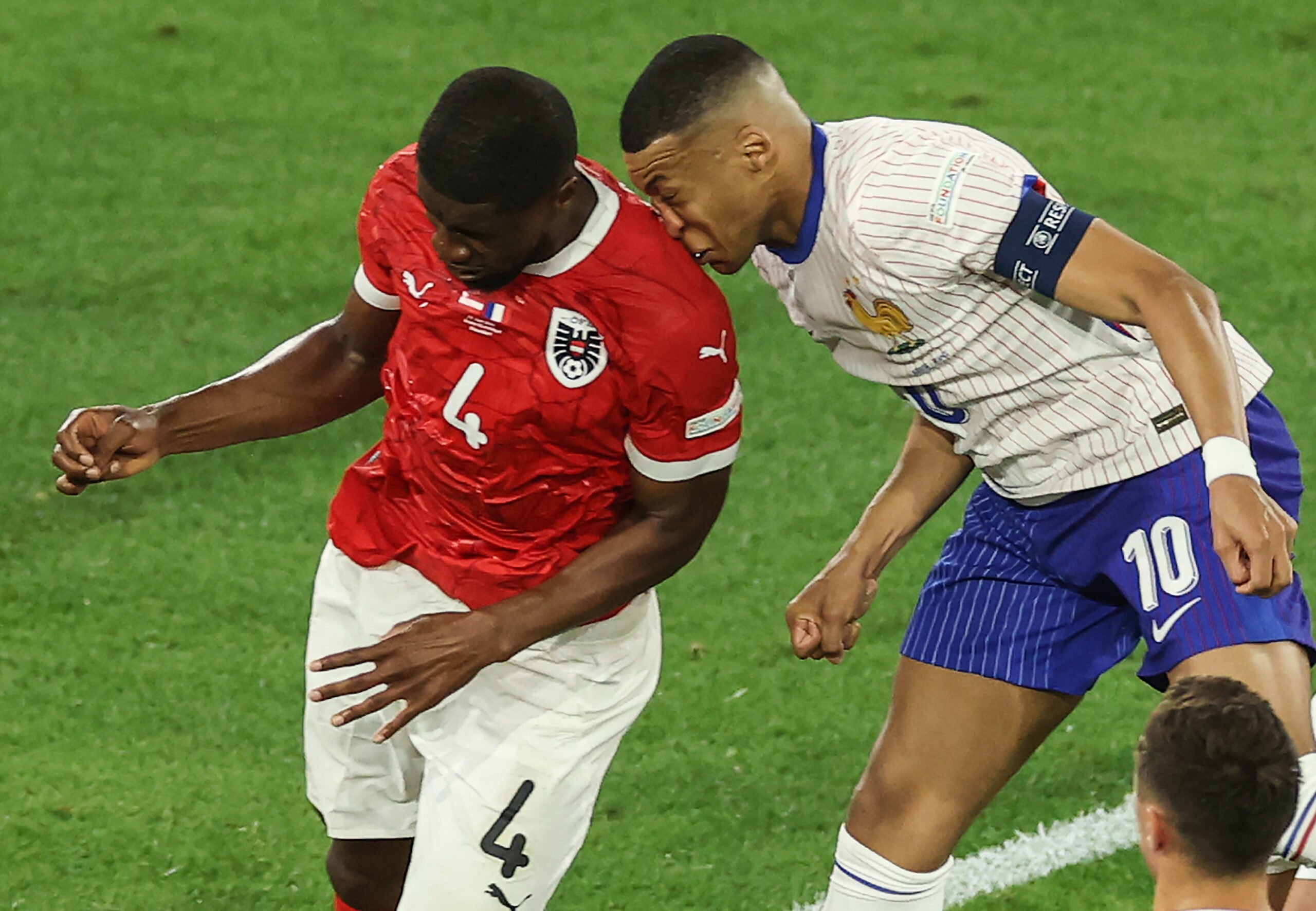 Mbappe's collision with Danso (Lars Baron/Getty Images)